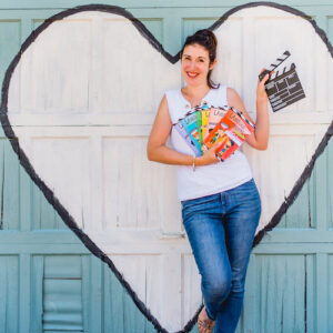 Author holding Language Theatre Books